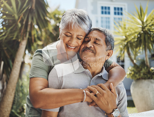 Image of Senior, couple and old man and woman hug with love, care and support outside their home or house. Lovers, pensioner and elderly people enjoying retirement together with happiness in marriage