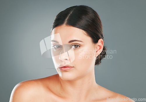 Image of Facial beauty, portrait and woman in studio for skincare, wellness and cosmetics. Young female model, face headshot and aesthetic dermatology, healthy shine and natural glow from body salon results