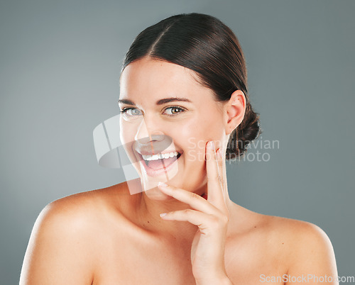 Image of Beauty, skincare glow and portrait of a woman face with wellness, facial and smile. Isolated, studio background and cosmetic dermatology treatment of a young person with happiness from cosmetics