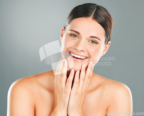 Image of Skincare, wellness and portrait of a woman in a studio with a cosmetic, beauty and natural face routine. Cosmetics, health and female model with a healthy facial treatment isolated by gray background