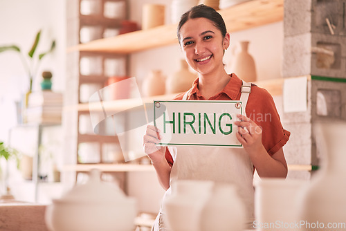 Image of Hiring sign, business owner or woman in portrait for retail experience, shop recruitment and startup job opportunity. Boss, person or employer hand holding board for onboarding, career or work search