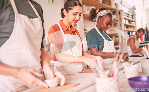 Image of Pottery class, group workshop or women design sculpture mold, clay manufacturing or art product. Diversity, ceramic retail store and startup small business owner, artist or people working in studio