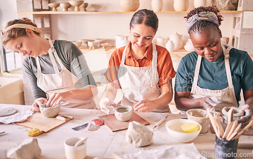 Image of Pottery class, creative workshop or women design sculpture mold, clay manufacturing or art product. Diversity, ceramic retail store or startup small business owner, artist or studio group molding