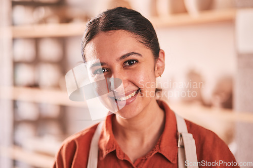 Image of Pottery, small business and portrait of a woman in a workshop for handicraft, creative and clay products. Artist, sculpture and female potter entrepreneur standing in her creativity or ceramic store.