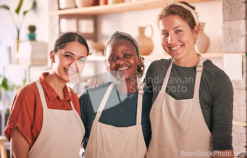 Image of Pottery, portrait and group of women in workshop, startup or small business for ceramic work. Creative, potter teamwork and people, friends or proud girls in studio or crockery manufacturing store.