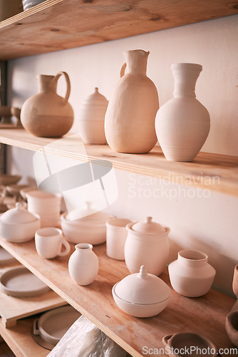 Image of Backgrounds, shelf and pottery in creative workshop, store and manufacturing startup. Ceramics, collection and display in studio, small business and retail craft market, shop and stock production