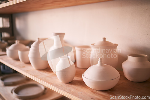 Image of Pottery background, ceramics and shelf in workshop, creative store or manufacturing startup. Clay products, collection and display in studio, small business and retail craft shop of stock production