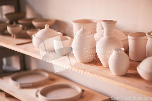 Image of Ceramics background, shelf and pottery in studio, creative store or manufacturing startup. Clay design, collection and display in workshop, small business and retail craft market of stock production