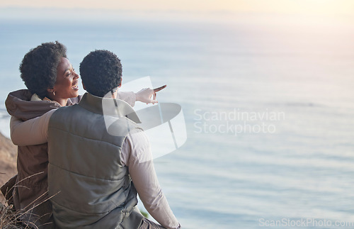 Image of Travel, ocean and hiking with black couple on mountain with mockup for views on adventure, nature and sunrise. Peace, discovery and expedition with man and woman for trekking, freedom and relax