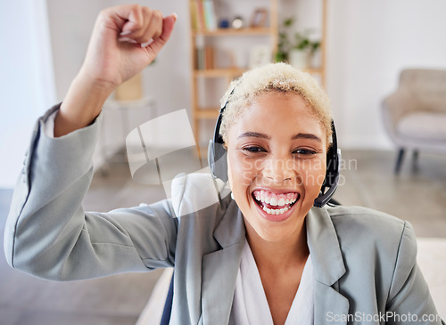 Image of Winner, success or excited black woman in call center company in celebration of winning a business deal. Smile, remote work or happy insurance agent celebrates reaching sales target, goals or mission