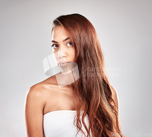 Image of Face, woman and hair in portrait, beauty and hair care, skin glow and shine isolated on studio background. Hairstyle, cosmetic skincare and mockup with wellness, keratin treatment and styling