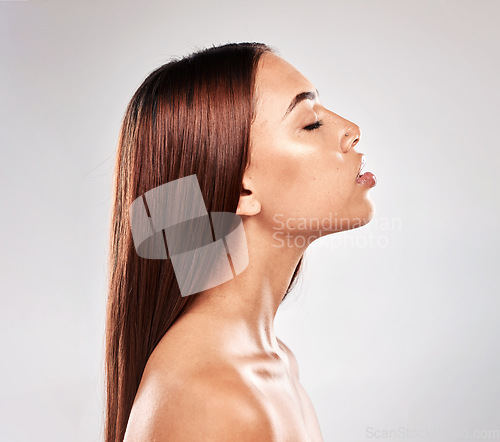 Image of Hair, beauty salon and woman profile haircut of a person with brazilian treatment in a studio. Gray background, isolated and natural healthy keratin shampoo of a model style shine after hairdresser