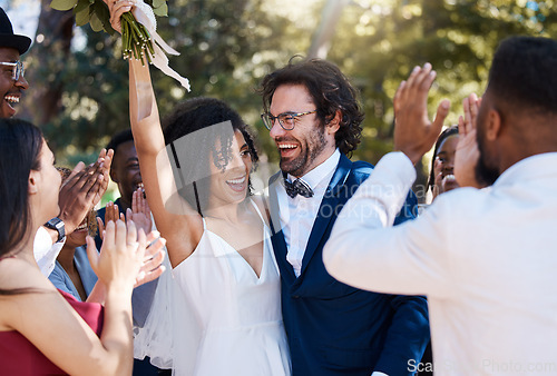 Image of Happy bride and groom celebrate wedding with excited and cheerful applause in crowd of guests. Interracial love and happiness of couple at marriage event together with clapping and smile.