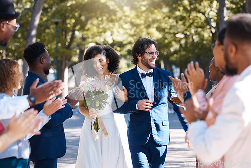 Image of Happy celebration and clapping for couple at wedding with excited, joyful and cheerful crowd of guests. Interracial love and partnership of people at marriage event with applause and smile