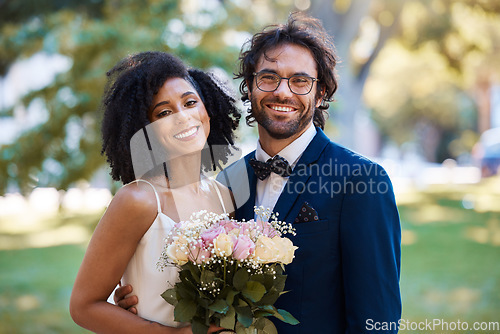 Image of Couple portrait, wedding and nature park marriage celebration event for bride and groom together. Married interracial man and woman outdoor with trust, partnership and a hug with flower bouquet