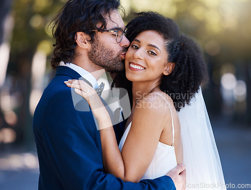 Image of Wedding bride and groom kiss portrait at romantic outdoor marriage event celebration together. Partnership, commitment and trust embrace of interracial people with excited and happy smile with bokeh