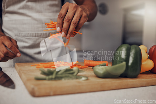 Image of Man hands, vegetables and cooking in kitchen for healthy nutrition, food diet and organic salad meal. Young male, chef hand and green vitamins lifestyle or cook dinner on kitchen counter in home