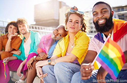 Image of Friends, city and portrait of lgbt people with rainbow flag for support, queer celebration and parade for solidarity. Diversity, lgbtq community and group enjoy freedom, happiness and pride identity