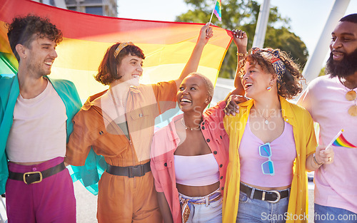 Image of Festival, city and happy lgbt friends with rainbow flag for support, queer celebration and parade for solidarity. Diversity, lgbtq community and people enjoy freedom, happiness and pride identity