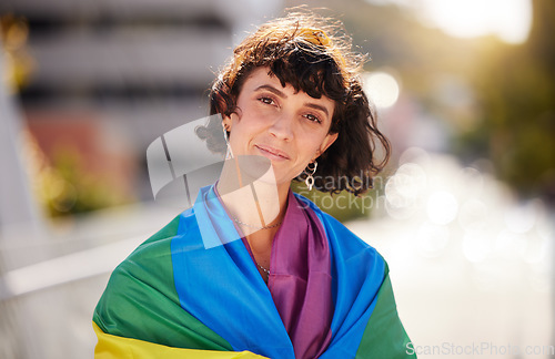 Image of Love, freedom and portrait of woman with pride flag in city, happy non binary lifestyle of equality and peace. Happiness, summer and fun for gender neutral people in lgbt rainbow community with smile