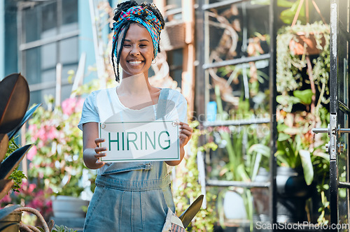 Image of Hiring sign, recruitment and onboarding with black woman in portrait, small business and entrepreneur with smile. Flower shop, florist and entrepreneurship, job opportunity and interview application