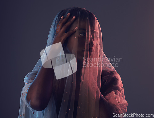 Image of Black woman, veil and fashion with creative, fabric and elegance with girl on dark studio background. African American female, lady and cover with textile, design and material for aesthetic style