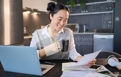 Image of Coffee, business and Asian woman with documents and laptop working on report, financial review and project. Remote work, planning and female worker with paperwork for schedule, budget and strategy