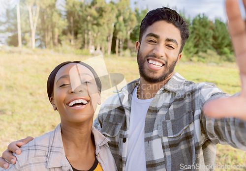 Image of Portrait, interracial and couple in nature, love and happiness on vacation, romance and bonding. Romantic, black woman and happy man in countryside, holiday and adventure for quality time and loving