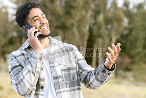 Image of Happy, laugh and phone call by man in a park, laughing while showing hand for wtf gesture on nature background. Smartphone, conversation and handsome male with hands, sign and surprised in forest