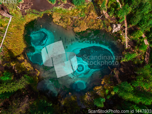 Image of Geyser lake with thermal springs