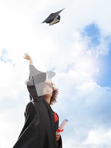 Image of Black woman, graduation and cap in air for celebration, happiness or success with diploma for studying at campus. University student, gen z girl and happy for goal, vision and achievement at academy