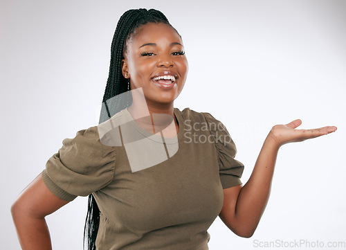 Image of Mockup, portrait and black woman palm on studio background, advertising space or show wall. Happy female model, hands and product placement of marketing, promotion announcement and presentation offer