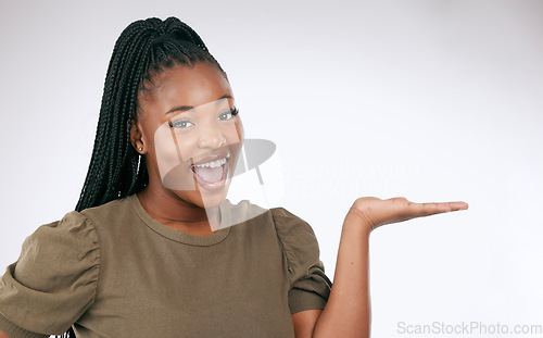 Image of Mockup, palm and portrait of happy woman, studio background and advertising space. Happy female model, hands and product placement of marketing promotion, excited announcement and commercial offer