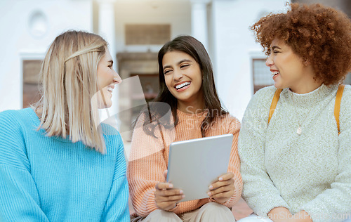 Image of Student, happy friends and tablet laughing for social media, funny meme or streaming entertainment at campus. Women enjoying 5G connectivity with laugh for fun joke or comedy on touchscreen together