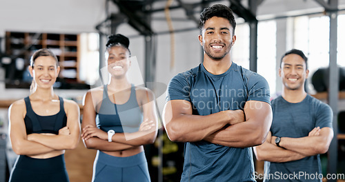 Image of Fitness, gym and portrait of group of people standing with crossed arms for leadership and confidence. Sports, collaboration and happy team after exercise, workout or training class in health studio.