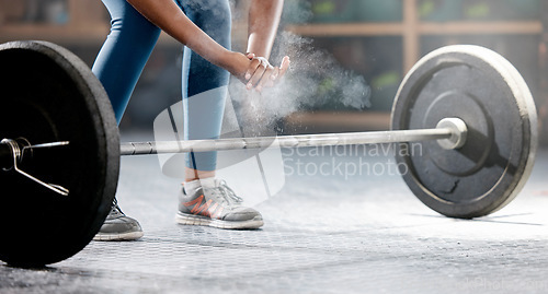 Image of Fitness, hands or bodybuilder with powder or barbell in training, workout or exercise for body goals. Deadlift, healthy person or sports athlete weightlifting with chalk dust in a gym club studio