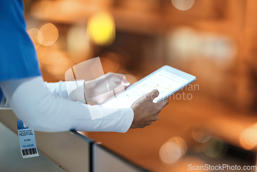 Image of Hands, tablet and nurse on hospital rooftop working on telehealth, research or online consultation in city. Bokeh, healthcare and woman with touchscreen technology for wellness app in clinic at night