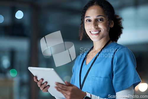 Image of Tablet, nurse portrait and black woman in hospital working on telehealth, research or online consultation. Medical, healthcare and female physician with technology for wellness app in clinic at night