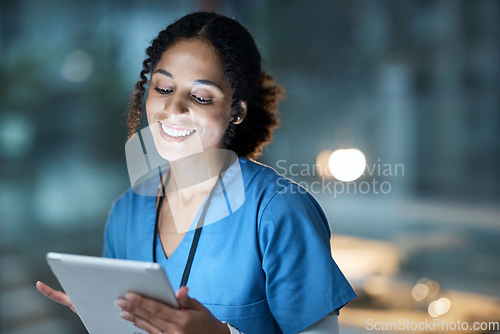 Image of Medical, research and night with doctor and tablet for planning, medicine and schedule. Technology, review and digital with black woman reading report for healthcare, science and life insurance news