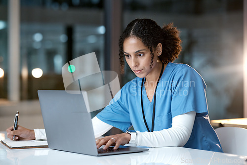 Image of Laptop, healthcare and doctor writing in notebook for medical research, planning and schedule in hospital. Telehealth, research and black woman with digital tech for online consultation in clinic