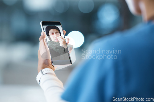 Image of Doctor hands, video call and telehealth with phone, patient and advice at night in hospital office. Medical expert, smartphone and communication for healthcare, consulting or help woman on web app