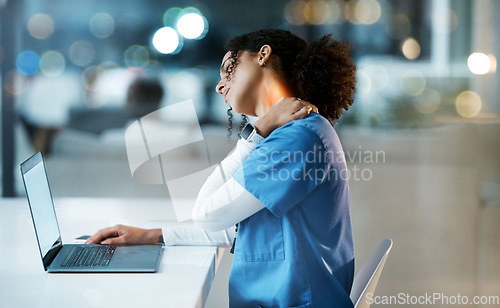 Image of Doctor, laptop and neck pain at night in stress, overworked or burnout by desk at the hospital. Woman medical professional suffering from painful injury, ache or inflammation working late on computer