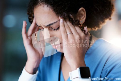 Image of Night, stress and headache with face of doctor for medical, thinking and deadline review. Burnout, accountability and mental health with black woman for healthcare, medicine and science research