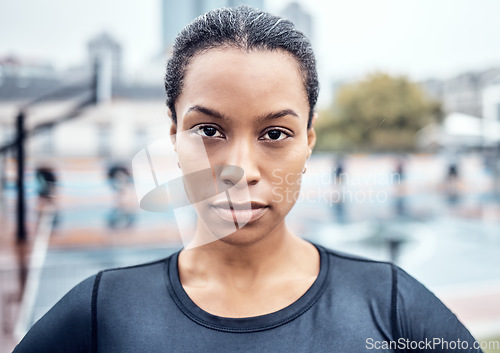 Image of Fitness, exercise and portrait of a woman athlete in the city for an outdoor run or sports training. Serious, motivation and face of young female runner with crossed arms after cardio workout outside