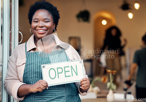 Image of Open sign, portrait and black woman in small business startup for shopping, customer service and retail success. Boss, manager or person hand holding board for welcome in new store with smile at door