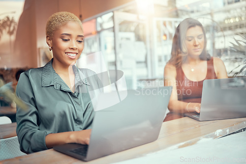 Image of Laptop, working and business women in cafe window for networking, planning and writing email. Communication, internet and female workers typing on computer for project ideas, research and remote work