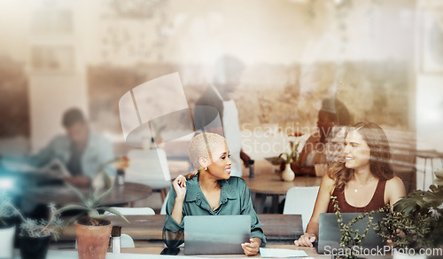 Image of Meeting, laptop and business women in cafe for planning, discussion and networking by window. Communication, teamwork and female employees working together on project ideas, conversation and strategy