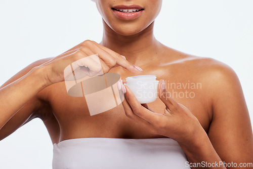 Image of Cream, jar and woman skincare for face, body and cosmetics in studio, isolated and white background. Facial lotion, beauty product and model with container for healthy glow, shine or aesthetic makeup