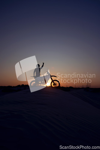 Image of Motorcycle, success and person silhouette celebrating victory against a night, sky and background in nature. Sports, motorbike and biker stop for accomplishment, achievement and biking on dirt road