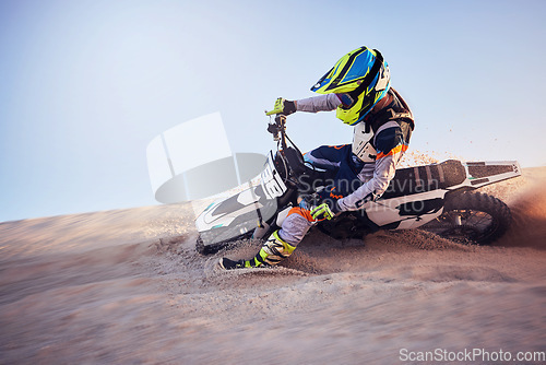 Image of Moto cross, sand hill or man on bike for extreme sport workout, sunset ride or exercise on dirt. Nature, sky or person riding for speed adventure in Dubai desert for training, fitness or race